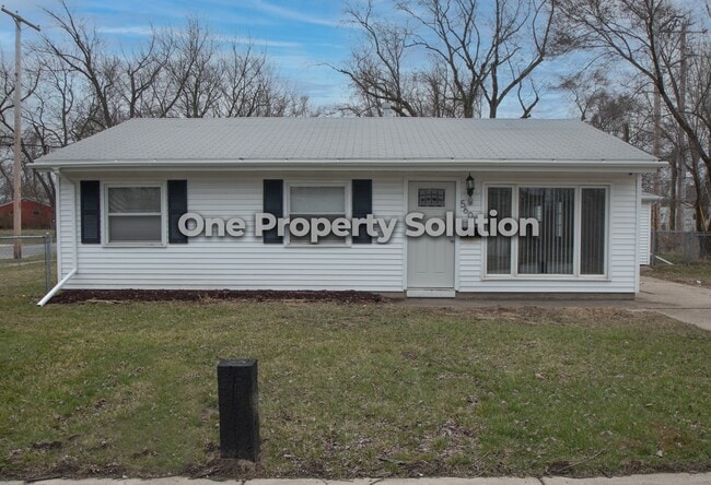property at 5601 E 10th Ave