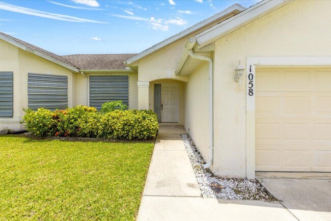 1058 SW Locke Ave in Port St. Lucie, FL - Building Photo - Building Photo