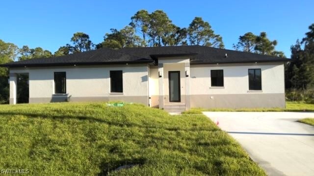 2006 W 14th St in Lehigh Acres, FL - Building Photo