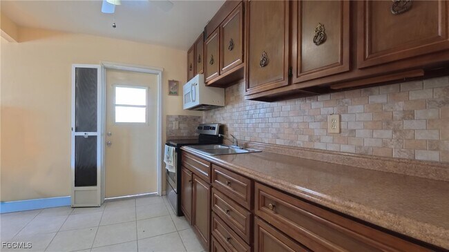 10 Dawn Flower Cir in Lehigh Acres, FL - Building Photo - Building Photo