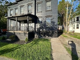 36-38-38 Washington St in Auburn, NY - Building Photo