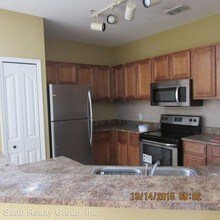6117 Metrowest Blvd-Unit -UNIT 103 in Orlando, FL - Foto de edificio - Building Photo