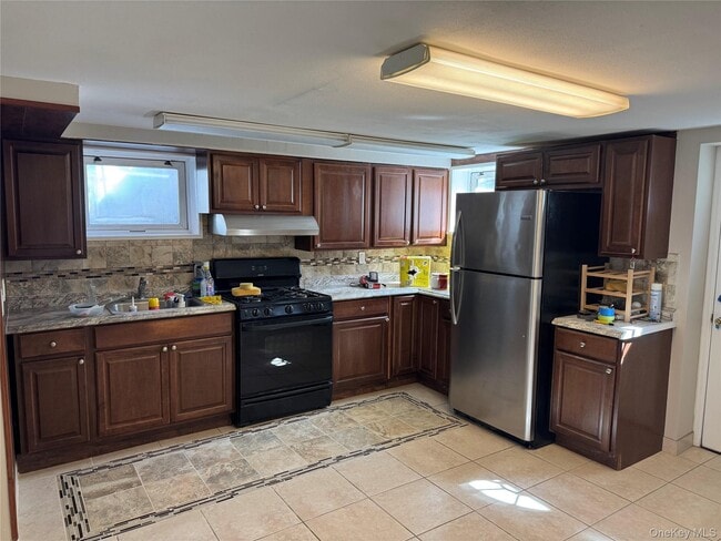 property at 56-25 136th St