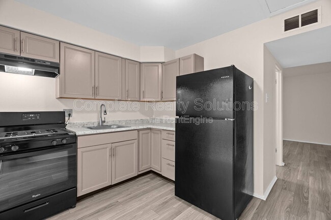 2323 Woodson Rd in Overland, MO - Building Photo - Building Photo