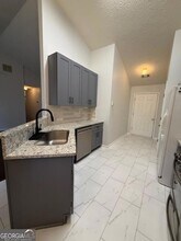 1695 Racquet Club Dr NW, Unit D8 in Lawrenceville, GA - Building Photo - Building Photo