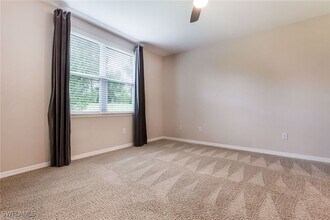 14533 Edgewater Cir in Naples, FL - Building Photo - Building Photo