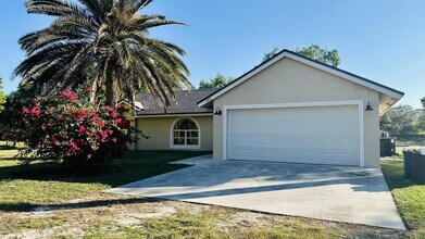 12816 67th St N in West Palm Beach, FL - Foto de edificio - Building Photo