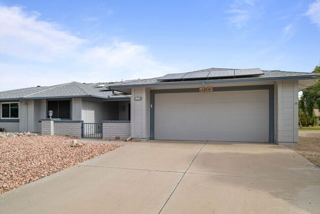 12934 W Blue Sky Dr in Sun City West, AZ - Building Photo - Building Photo