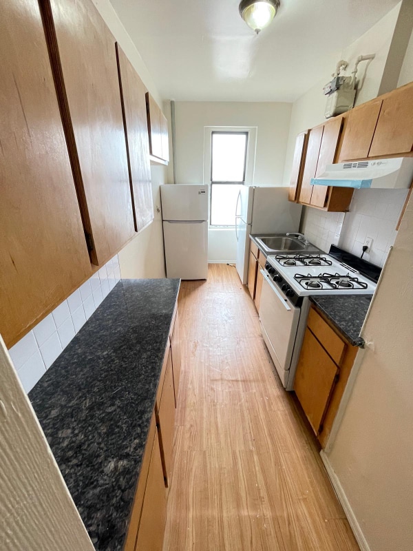 property at 229 W 232nd St