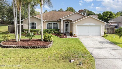 1510 Gardenton St NW in Palm Bay, FL - Foto de edificio - Building Photo