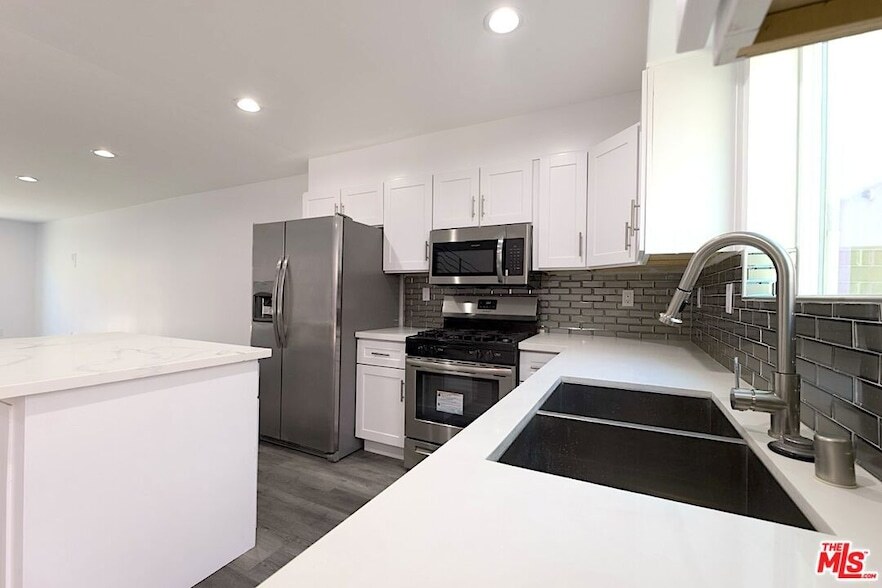 17610 Sherman Way, Unit F205 in Los Angeles, CA - Building Photo