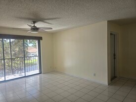 1455 SW Silver Pine Way, Unit 106D2 in Palm City, FL - Building Photo