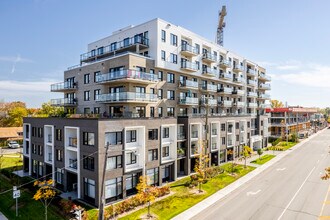 Le Virtuo in Laval, QC - Building Photo - Building Photo