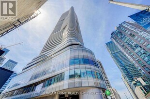 11 Wellesley St W, Unit 2811 in Toronto, ON - Building Photo