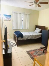 10023 Winding Lake Rd in Sunrise, FL - Building Photo - Building Photo