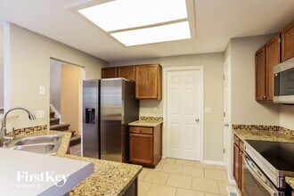 12801 E Wyoming Cir in Aurora, CO - Building Photo - Building Photo
