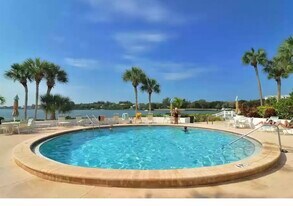 1630 Stickney Point Rd, Unit 102 in Sarasota, FL - Building Photo