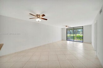2450 Deer Creek Country Club Blvd in Deerfield Beach, FL - Building Photo - Building Photo