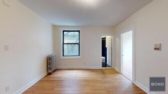 207-209-209 W 11th St in New York, NY - Building Photo