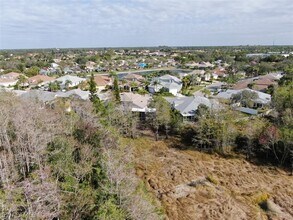 15071 Sterling Oaks Dr in Naples, FL - Foto de edificio - Building Photo
