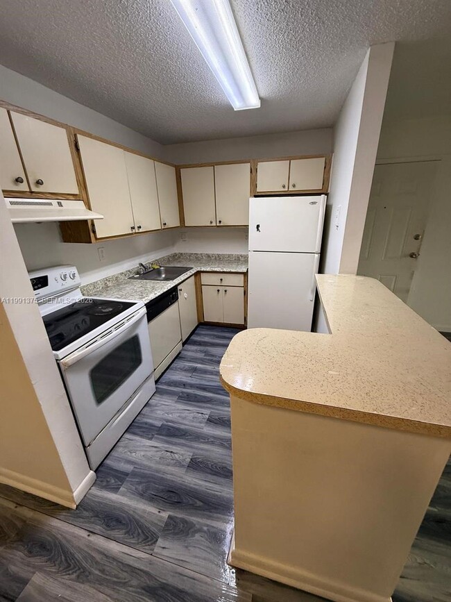 property at 7210 NW 179th St