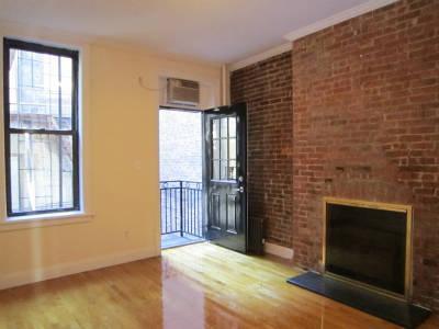 property at 102 E 7th St