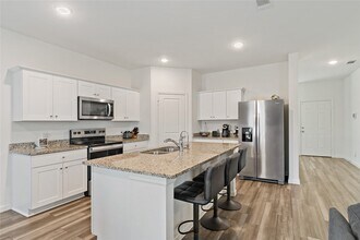 21568 Rolling Streams Dr in New Caney, TX - Building Photo - Building Photo