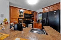 8750 N Sherman Cir in Miramar, FL - Building Photo - Building Photo