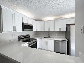 1415 14th Ct in Palm Beach Gardens, FL - Building Photo - Building Photo