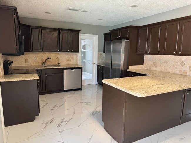 4130 NW 9th Ct in Coconut Creek, FL - Building Photo - Building Photo