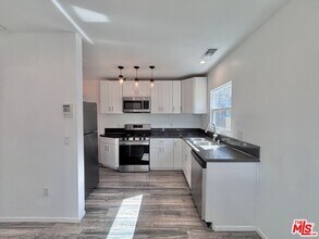 3774 S Gramercy Pl in Los Angeles, CA - Building Photo - Building Photo