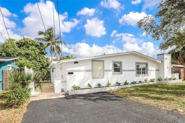 property at 4421 NW 34th Ct