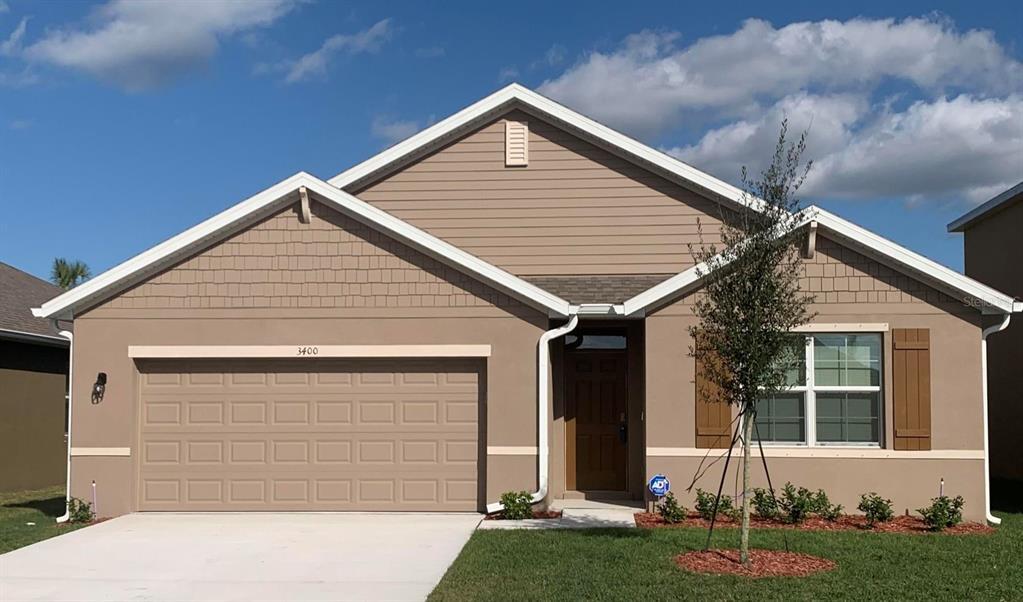 3400 Burrowing Owl Dr in Mims, FL - Building Photo