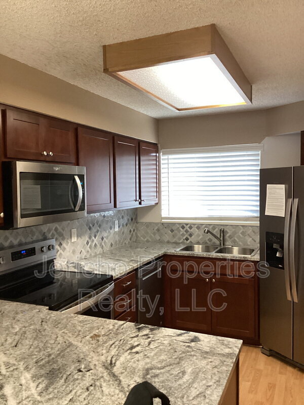 8733 W Cornell Ave in Lakewood, CO - Building Photo - Building Photo