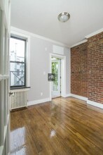 Mott Street, Unit 5R in New York, NY - Building Photo - Building Photo