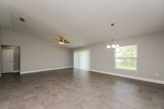 155 Birmingham Dr in Poinciana, FL - Building Photo - Building Photo