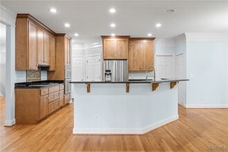 11465 Pinewild Dr in Providence Forge, VA - Foto de edificio - Building Photo