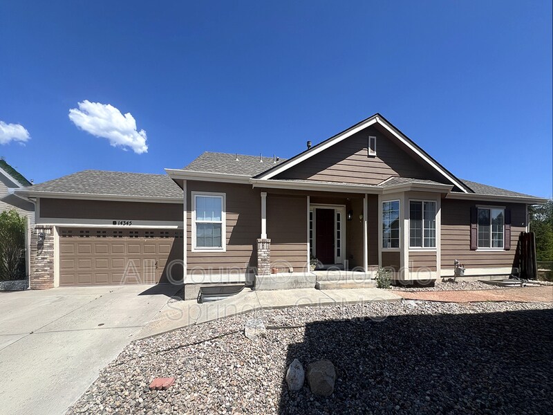 14345 Woodrock Path in Colorado Springs, CO - Foto de edificio