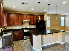 10428 Doman Ave in Las Vegas, NV - Building Photo - Building Photo