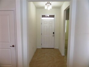 7997 Penrose Pl in Wildwood, FL - Building Photo - Building Photo