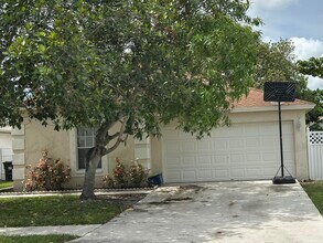 5165 Foxhall Pl in West Palm Beach, FL - Foto de edificio - Building Photo
