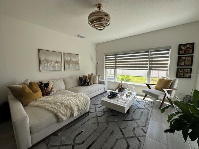 1289 Wispy Cypress Dr in Kissimmee, FL - Building Photo - Building Photo