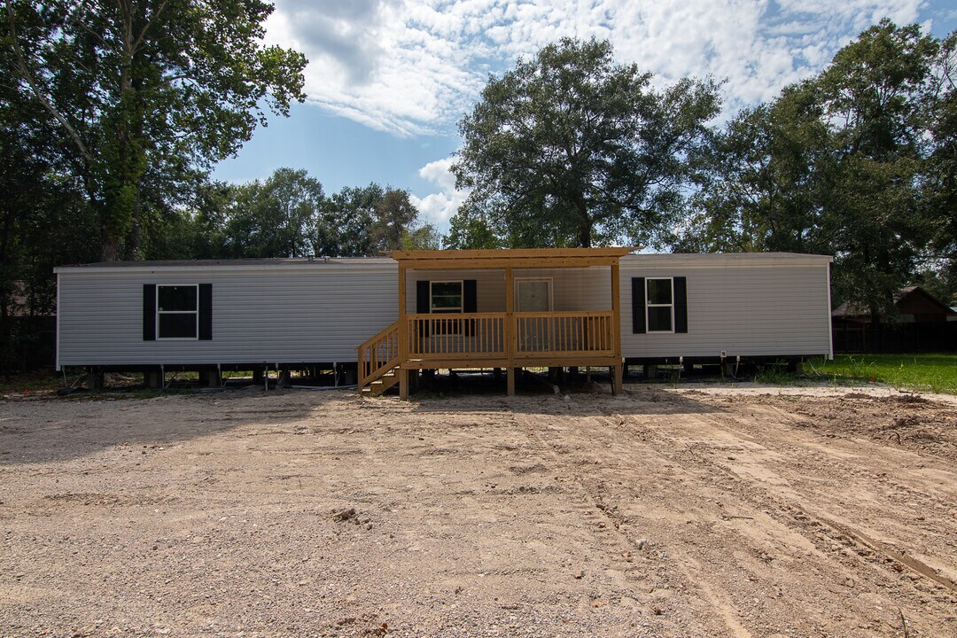 10002 Sweetgum Ln in Lumberton, TX - Building Photo