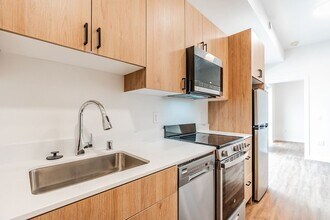 Atrium - Welcome to South Seattle’s Newest Modern Living Experience — Steps From the Light Rail in Seattle, WA - Foto de edificio - Interior Photo