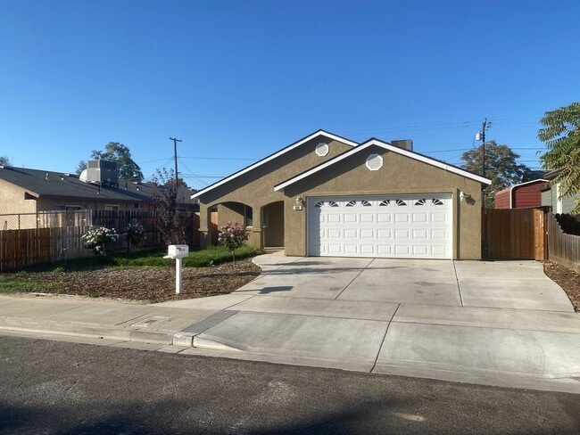 property at 409 E 9th St