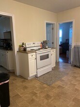552 Rogers St, Unit 1 in Lowell, MA - Foto de edificio - Building Photo