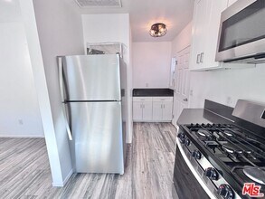 3774 S Gramercy Pl in Los Angeles, CA - Building Photo - Building Photo