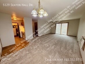 5129 Seaton Hall Dr in Machesney Park, IL - Building Photo - Building Photo