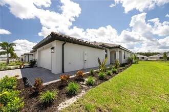 19609 Hinkley Dr in Estero, FL - Building Photo - Building Photo