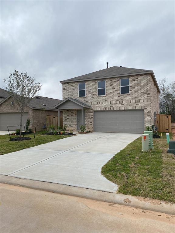 690 Falling Cave Dr in Willis, TX - Building Photo - Building Photo